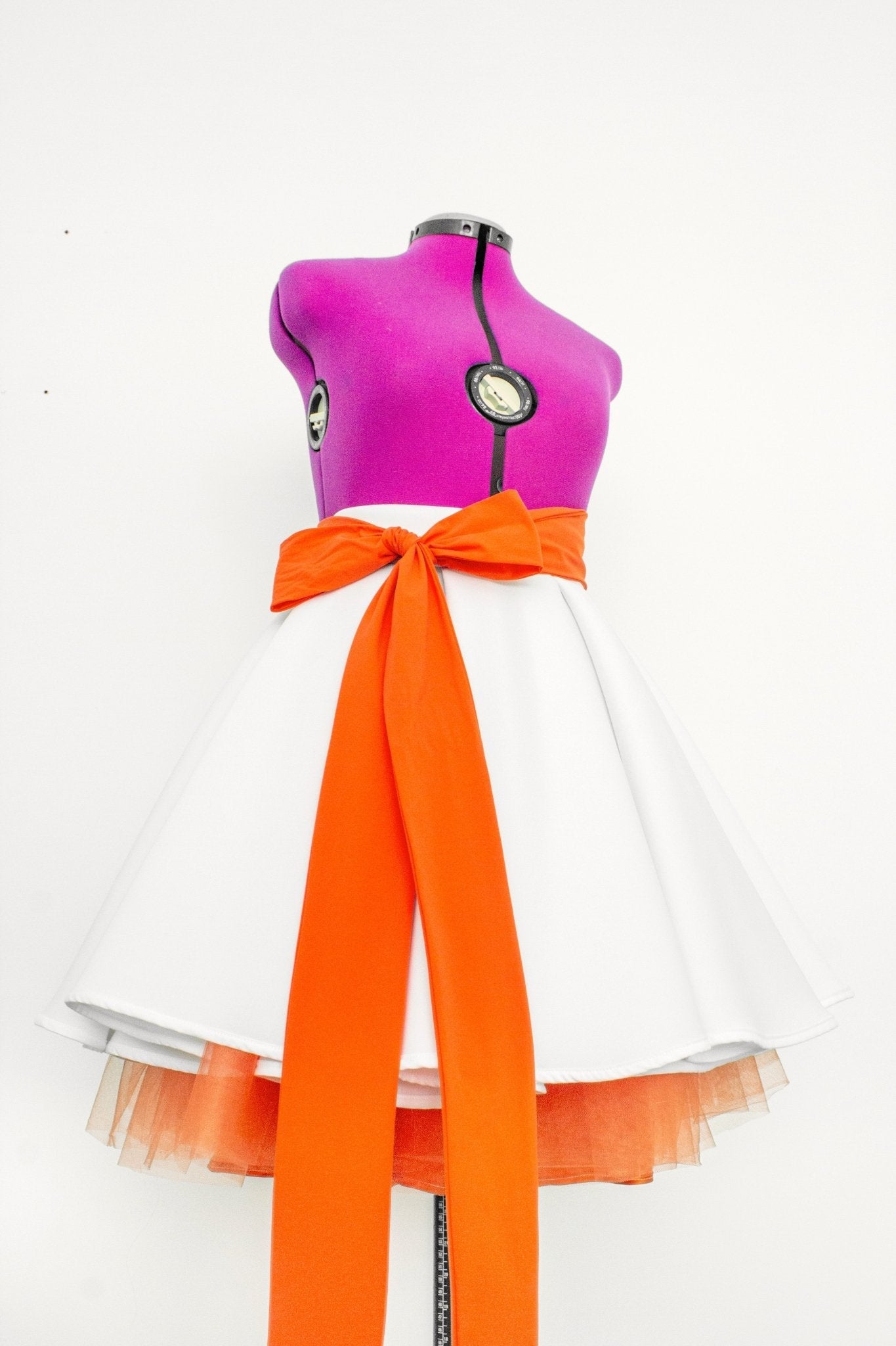 Elegant Mid - Length White Neoprene Skirt with Pleated Waist and Orange Tulle Underskirt and Long Soft Tie Bow - Made To Measure By Asya Kolarova